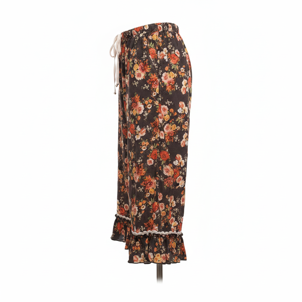 Women's dark brown floral wide-leg capri pants side profile showing full silhouette and lace trim