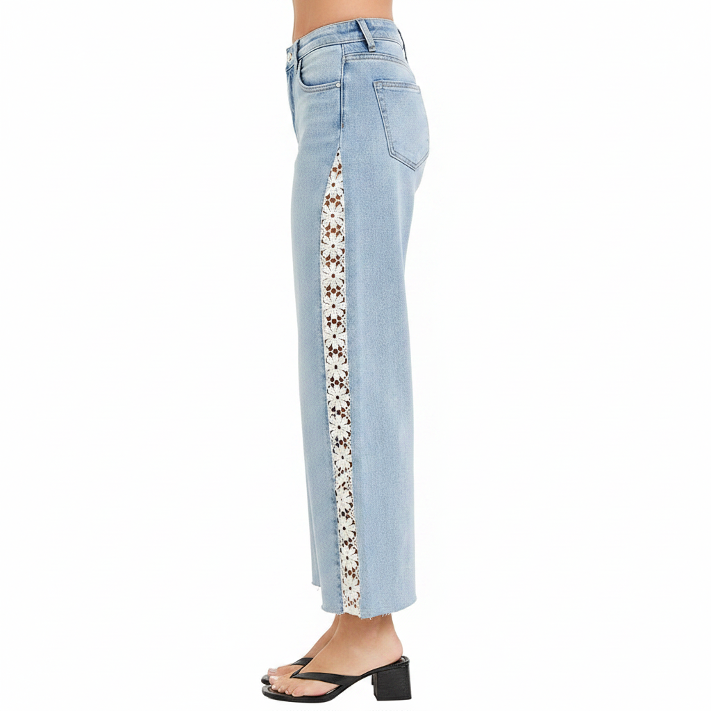 Women's light blue crop wide leg jeans side profile showing high rise waist and floral lace panel silhouette