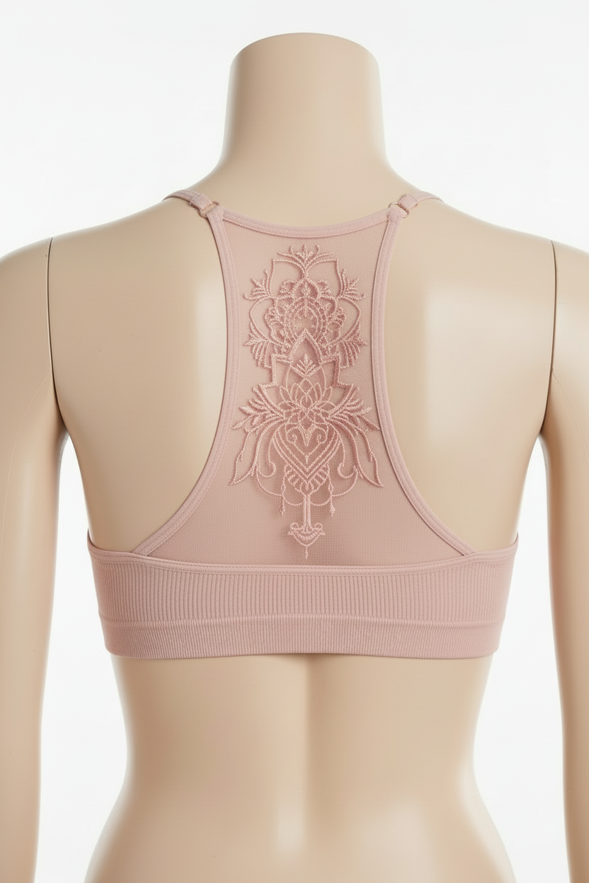 Leto Collection blush racerback bralette back view on mannequin, tattoo mesh mandala panel detail, white background
