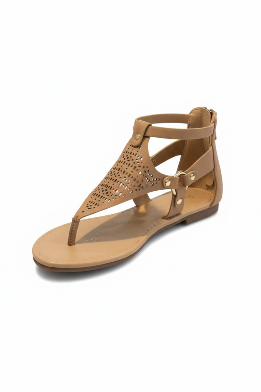 Tan sandal with cut-out design on a white background