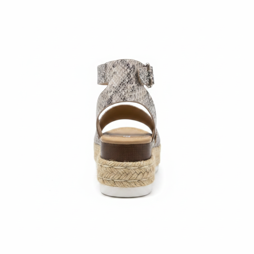 Women's python snake print espadrille platform sandal back view showing ankle strap buckle detail and jute platform heel