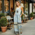 Denim pants styled with model standing near boutique storefront - BellanBlue