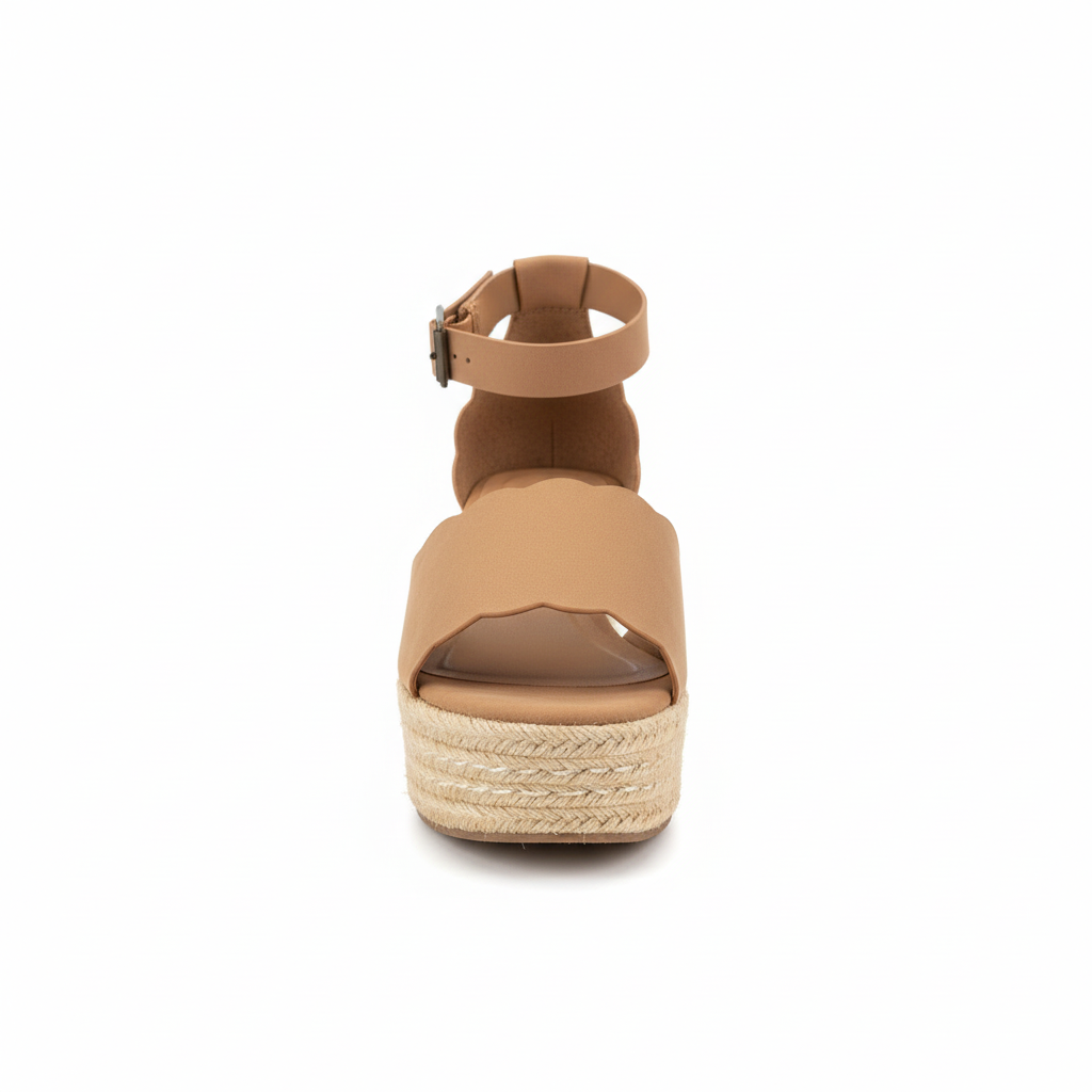 Women's tan espadrille wedge sandals with scalloped edges front view on white background
