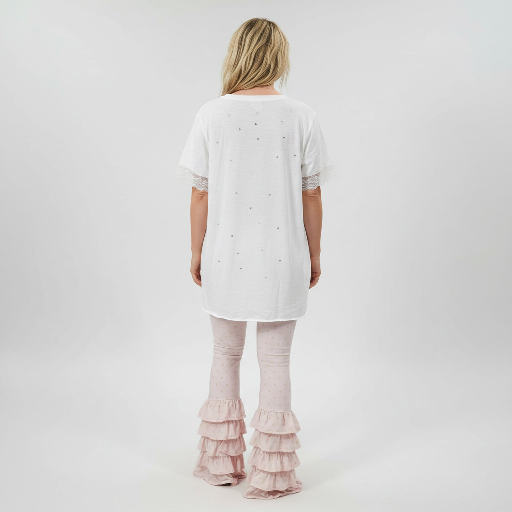 Women's white oversized tattered tee with rhinestone embellishments and lace sleeve trim, back view, studio