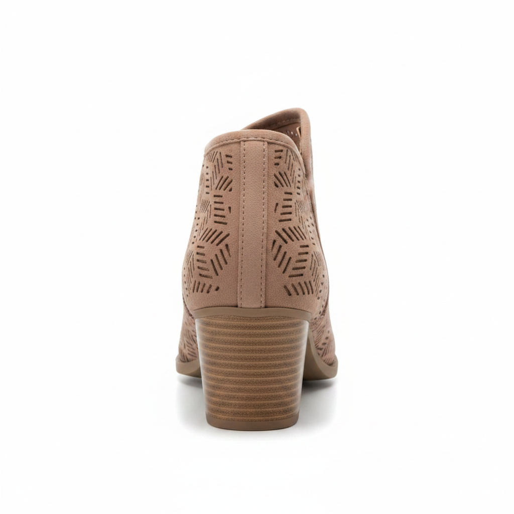 Back view of women's dusty blush laser cut ankle bootie showing stacked block heel and side zipper closure