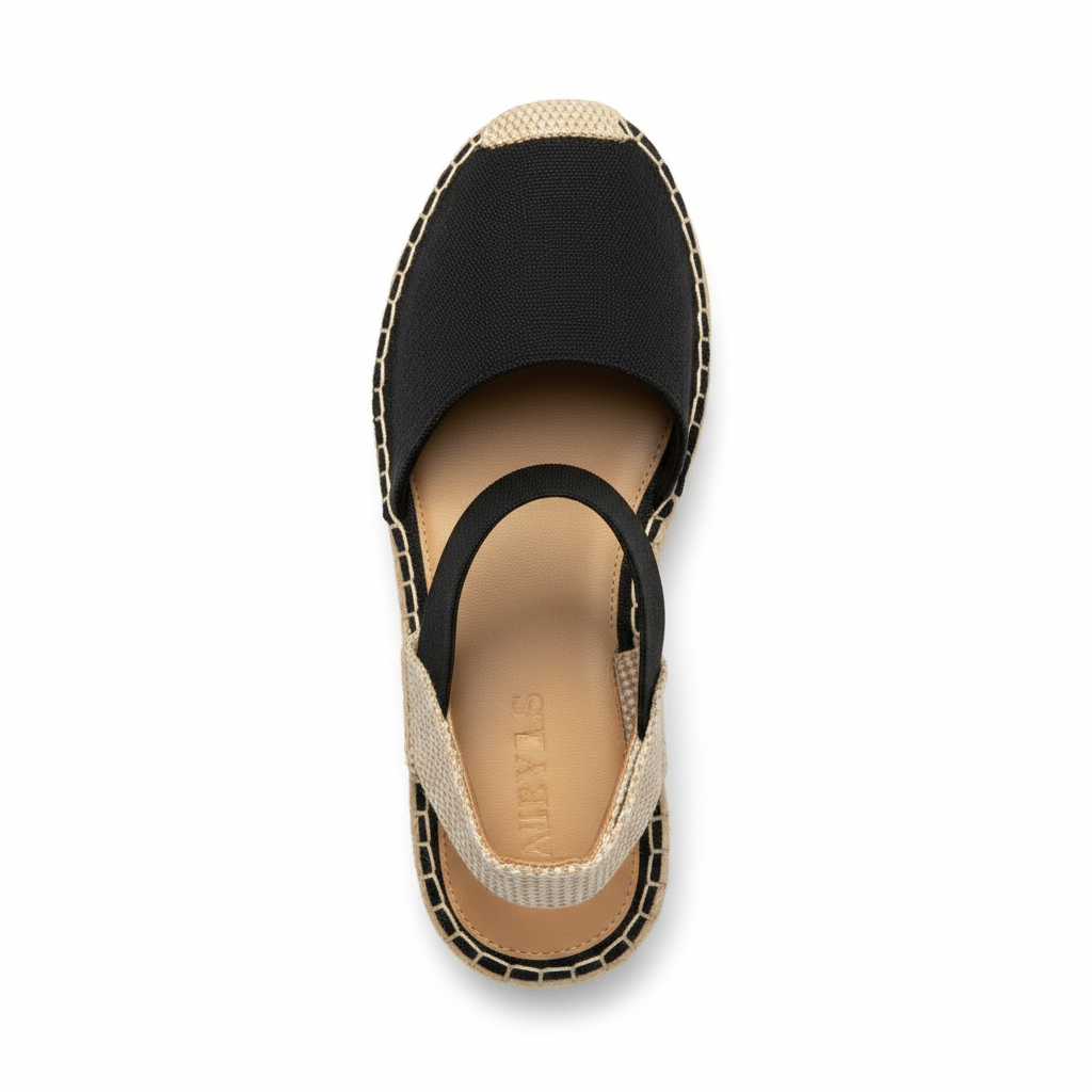 Top view of black espadrille platform sandal showing tan footbed and open toe design