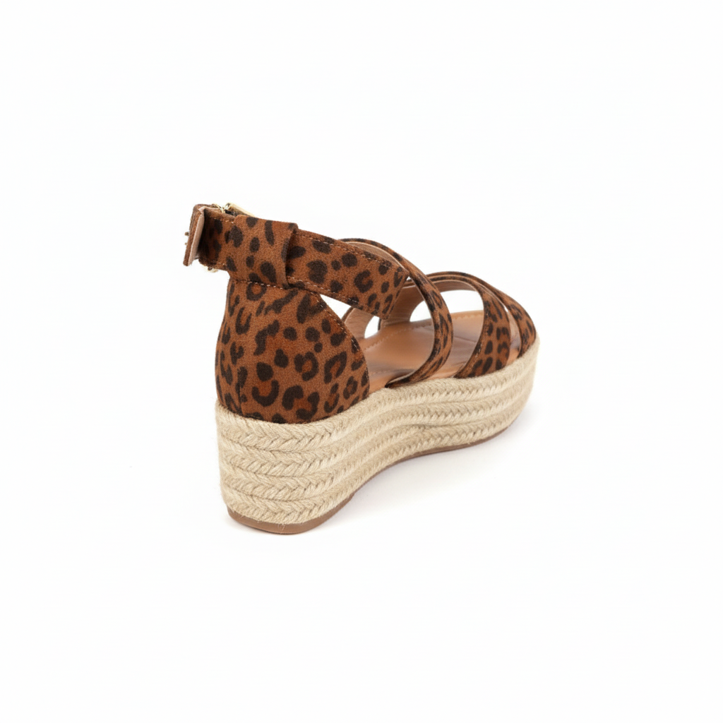 Side profile of leopard print espadrille platform sandal showing 2-inch platform height and espadrille jute sole detail