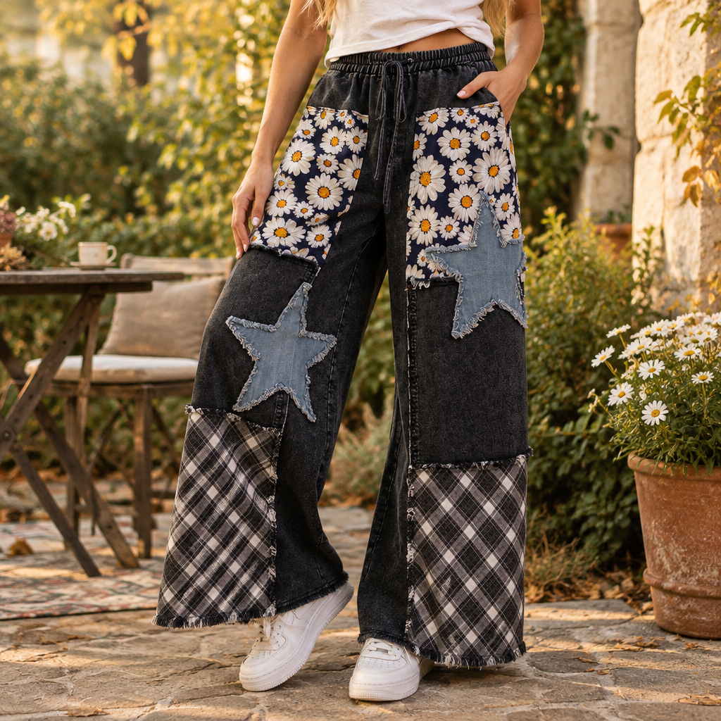 Sage + Fig denim wide-leg pants detail with drawstring waist, daisy panels and star appliqués