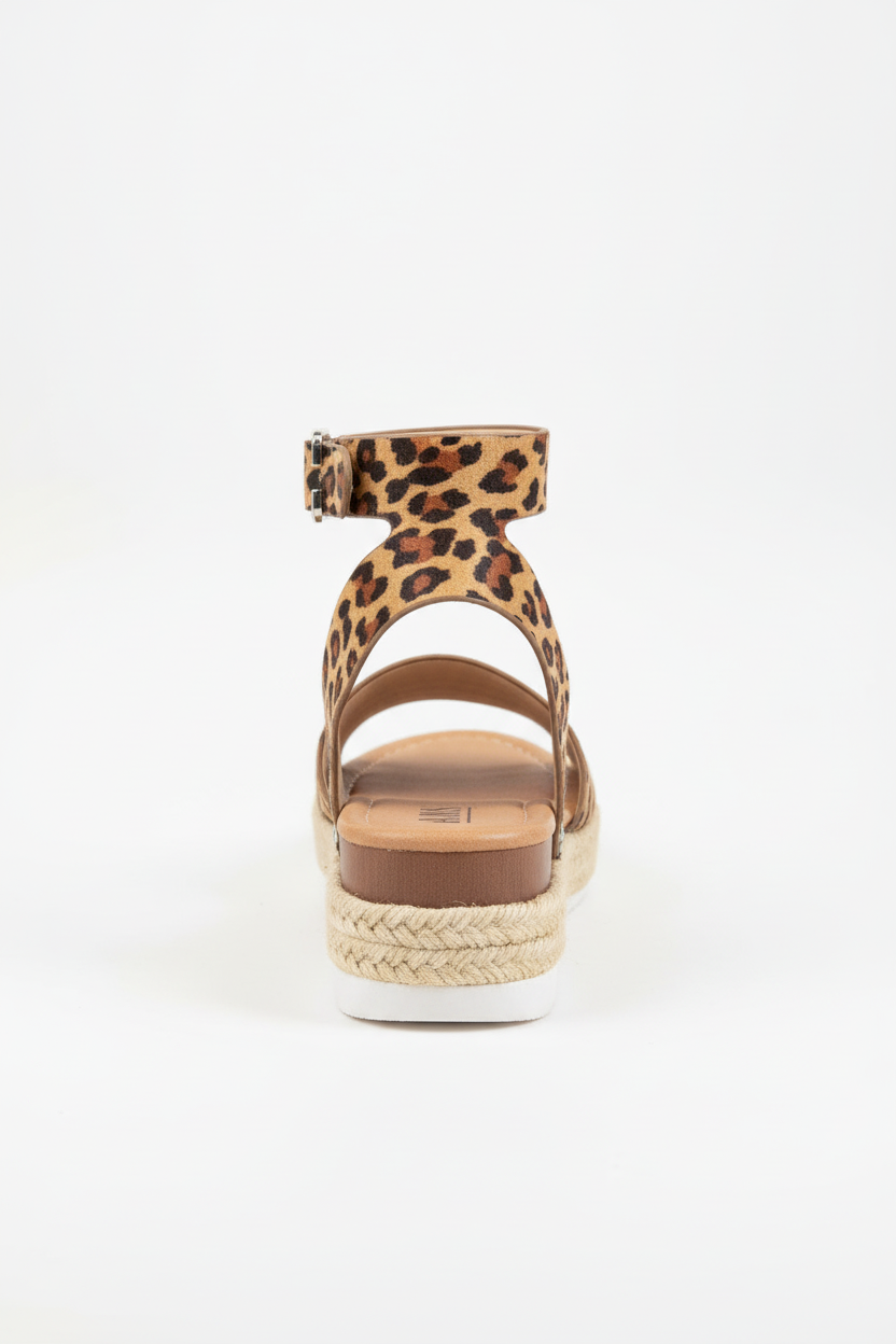 Women's leopard print espadrille platform sandal back view showing platform sole detail