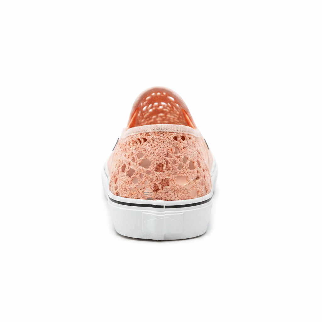 Women's peach crochet slip-on sneaker back view showing heel collar and white vulcanized sole, white background