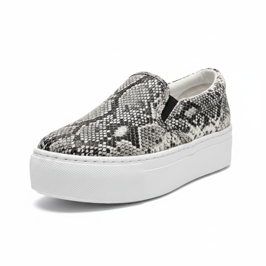 Women's black white snakeskin platform slip-on sneaker 3/4 front angle studio white background - BellanBlue