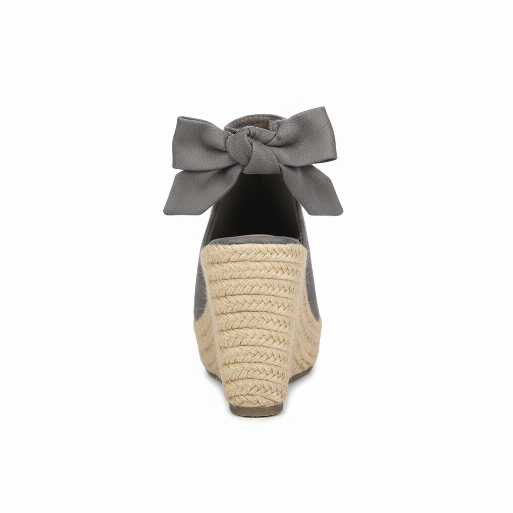 Grey espadrille wedge sandal back view showing ankle strap and bow detail