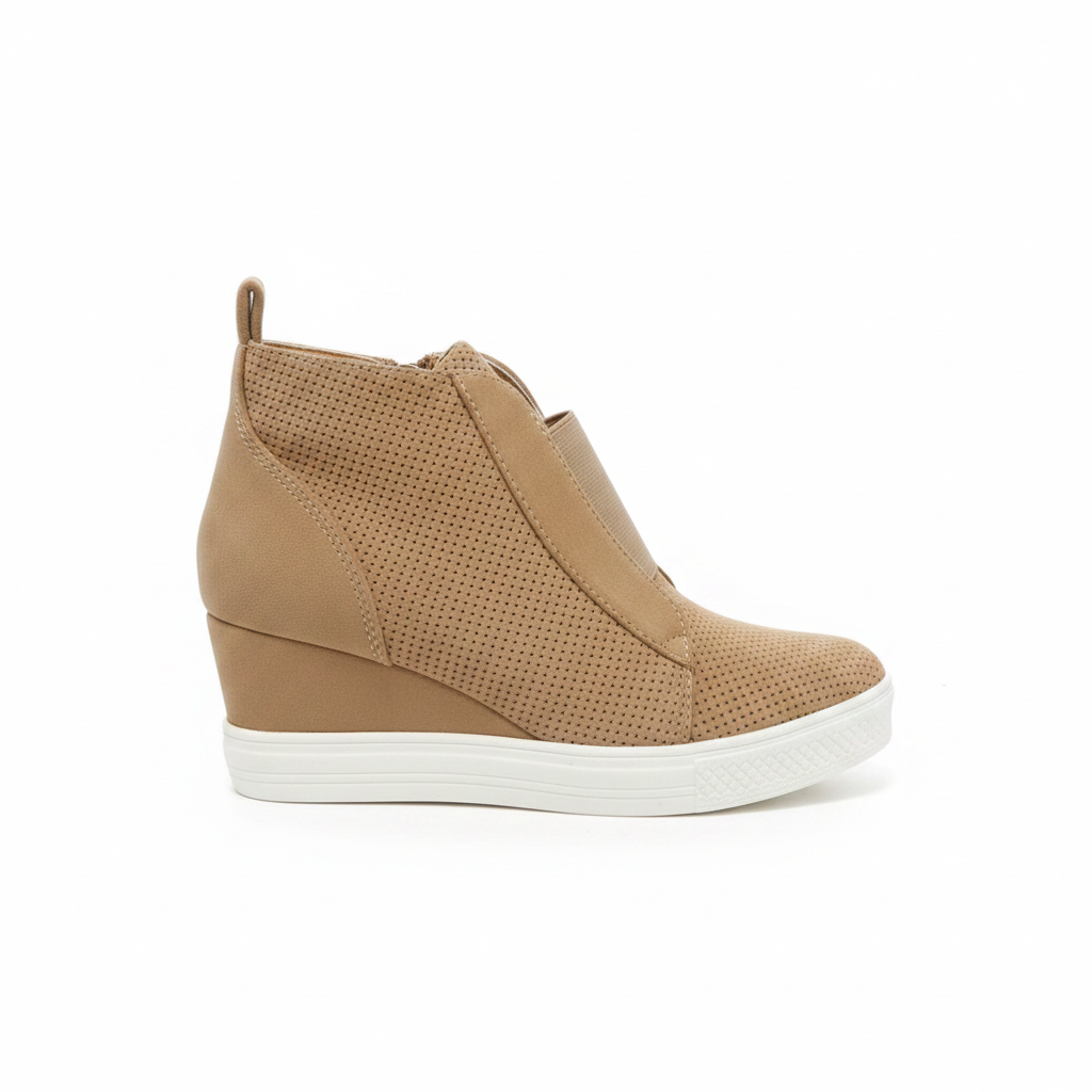 Camel perforated wedge sneaker bootie outer side profile, gold side zip hardware and white platform sole on white background