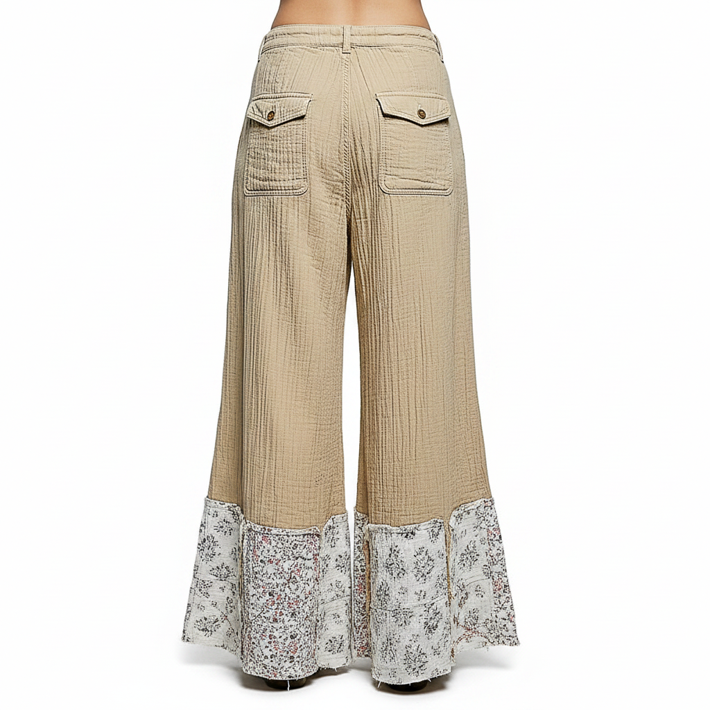 Women's tan quilted wide-leg pants back view, ghost mannequin, floral patchwork hem, crinkle cotton fabric