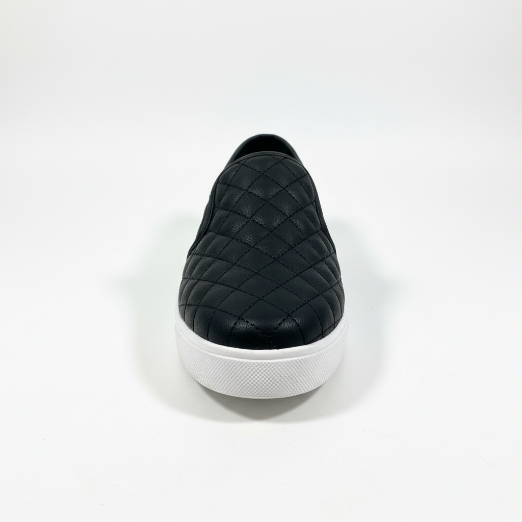 Black quilted slip-on platform sneakers - front view