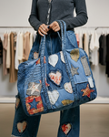 POL Clothing Women's Deep Denim POL Patchwork Denim Tote Bag with frayed heart patch and mixed denim washes
