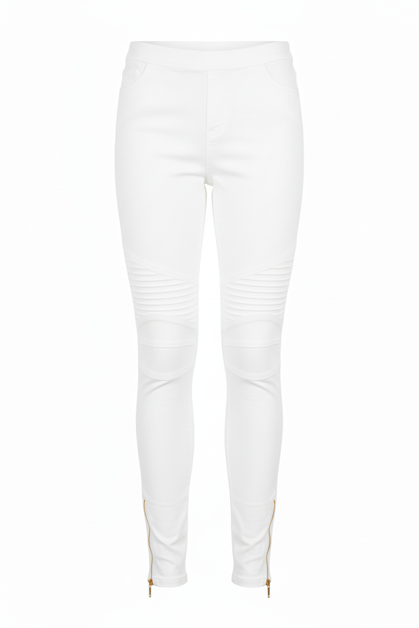 Women's moto leggings in white - front view showing moto seaming, knee ruching, and gold ankle zipper