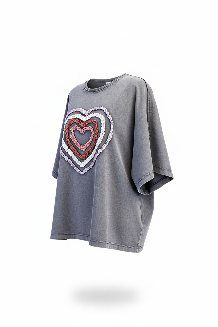 Oversized Heart Applique Terry Top in Smoke Gray - Front Three-Quarter View showing multi-color ruffled heart detail and relaxed fit