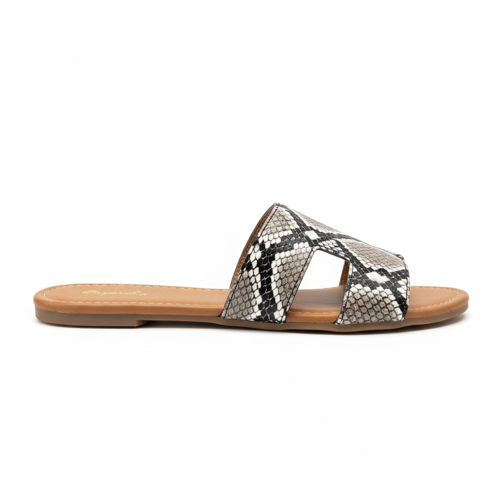 Snake print slide sandals side profile view showing flat sole and comfort design