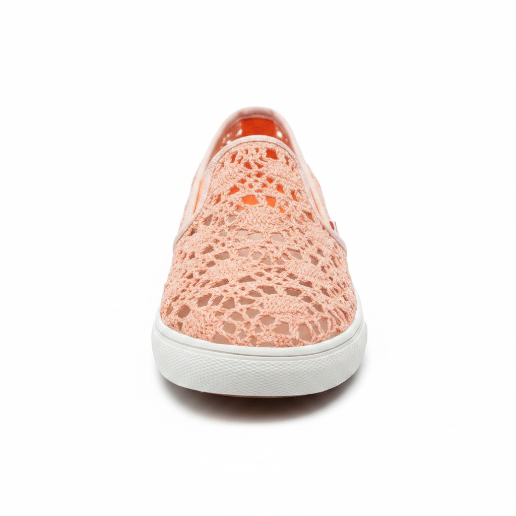 Women's peach crochet open-lace slip-on sneaker front view, white rubber sole, white background - BellanBlue