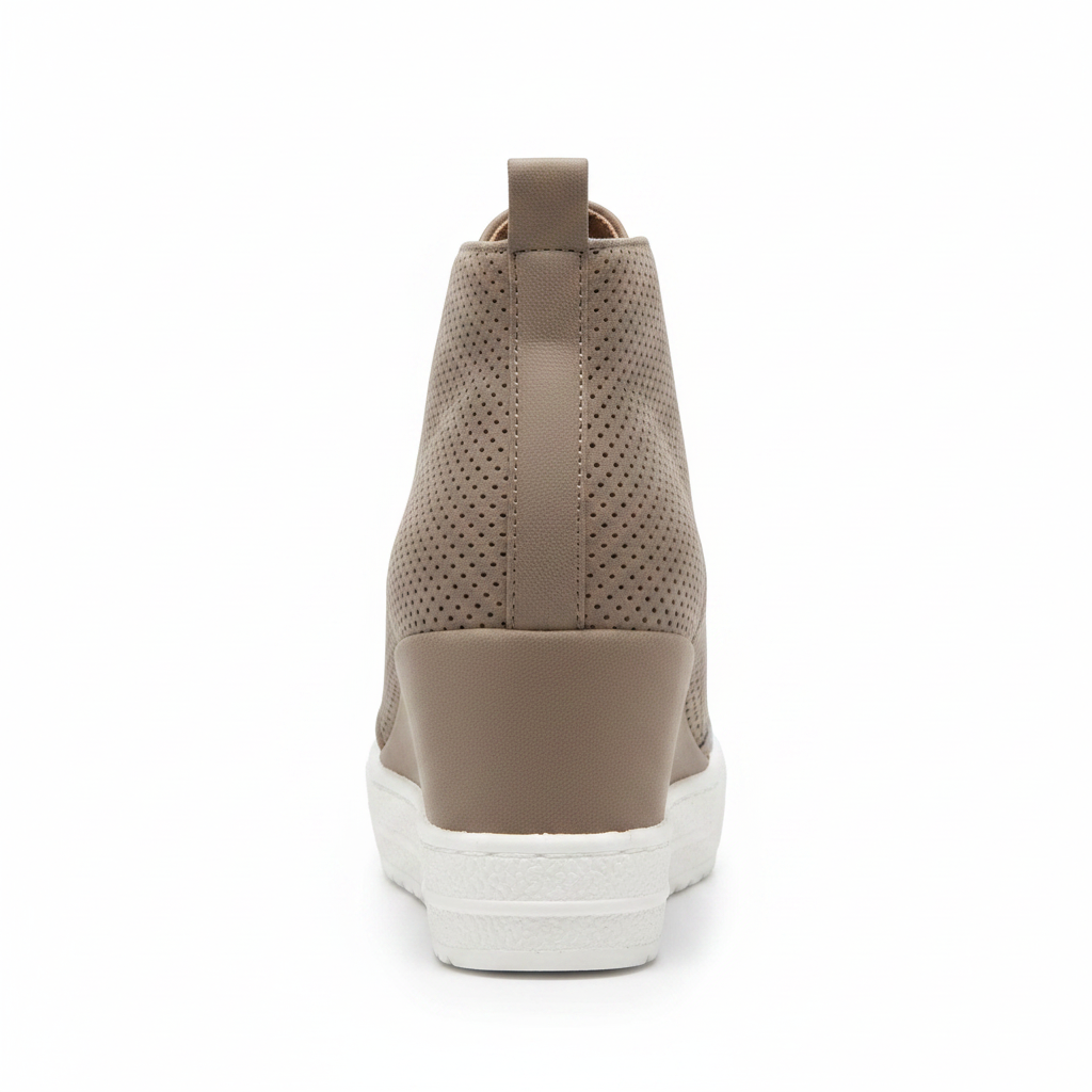 A single taupe wedge sneaker shown from the back, featuring a perforated leather upper, a solid taupe wedge heel, and a white rubber sole, set against a plain white background.