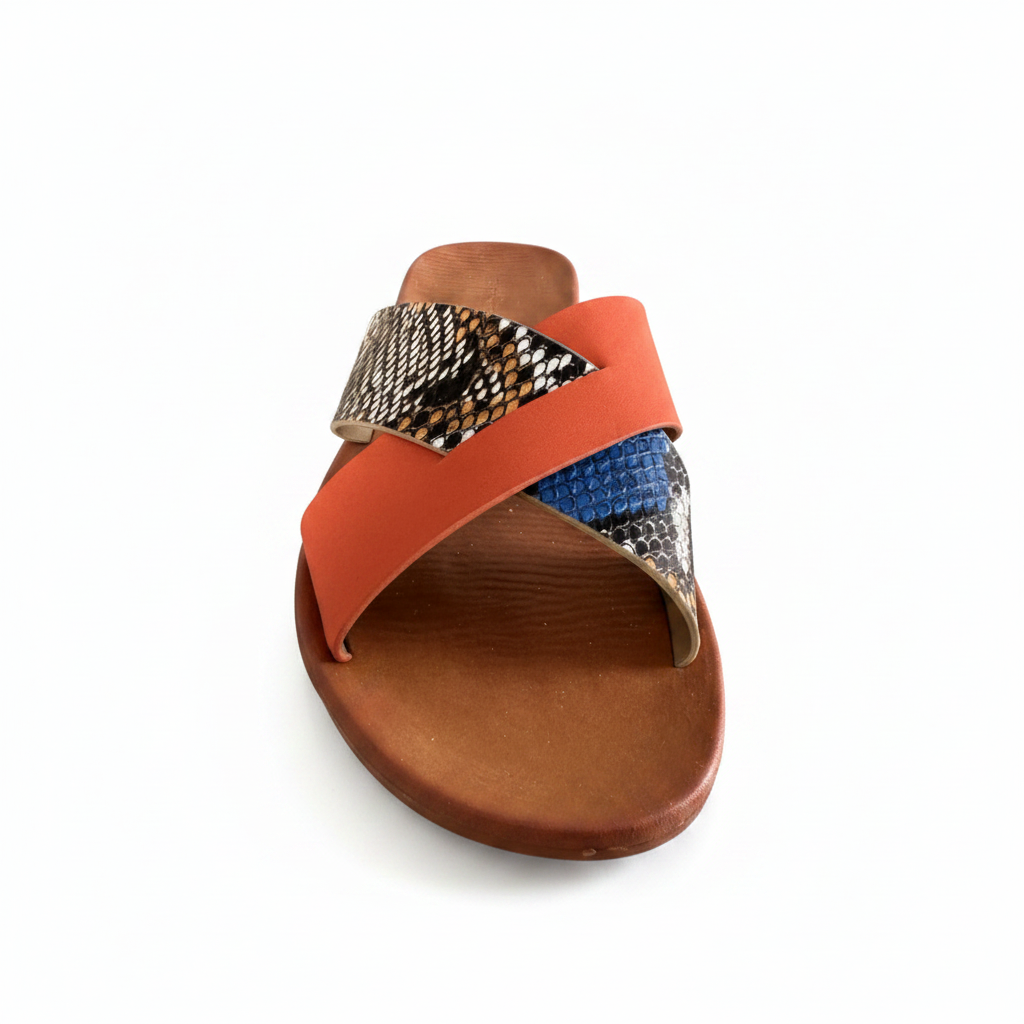Women's cross strap slide sandal front view - terracotta orange strap with python-print patchwork upper in brown and cobalt blue on cognac sole - BellanBlue