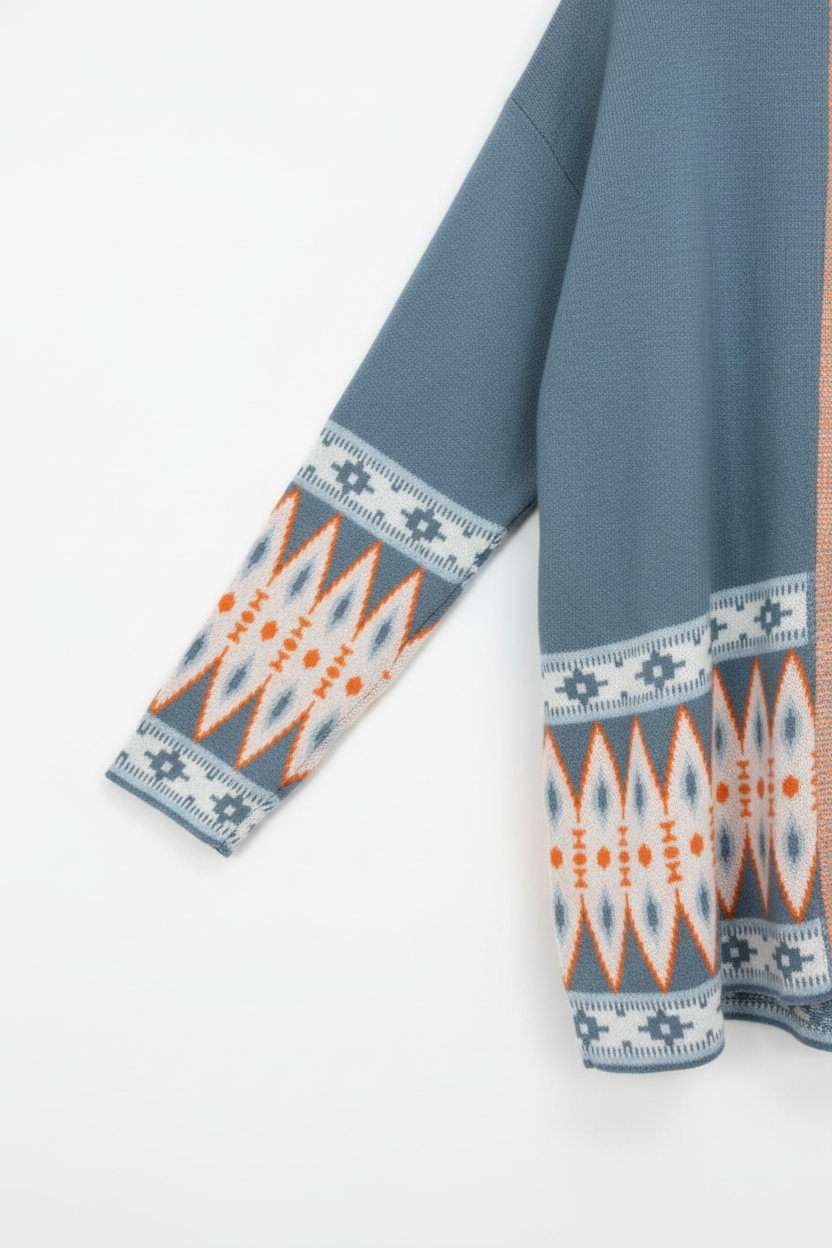 Aztec cardigan - detail shot of geometric print trim and color-block knit