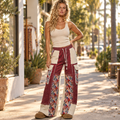 POL Clothing women's burgundy floral patchwork thermal wide-leg pants on a boutique sidewalk - BellanBlue