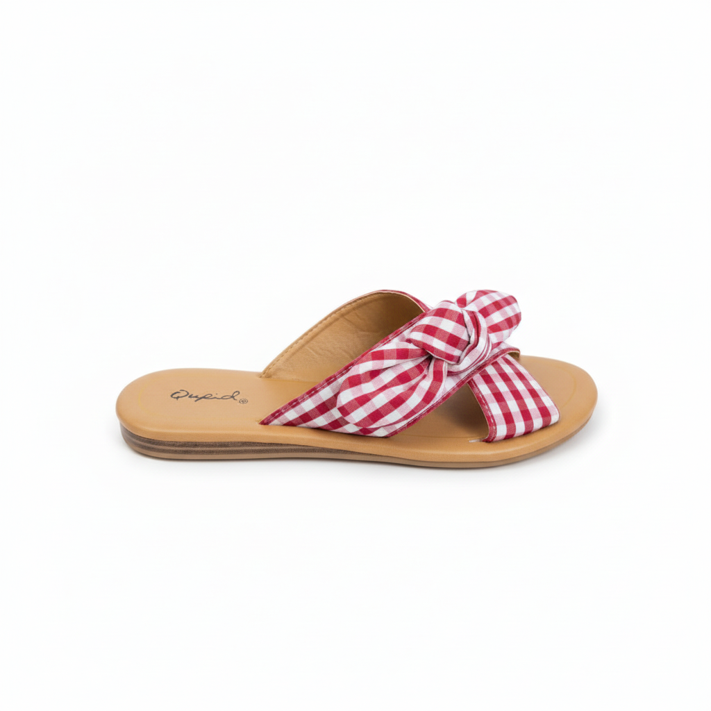 Red and white gingham bow sandals on white background
