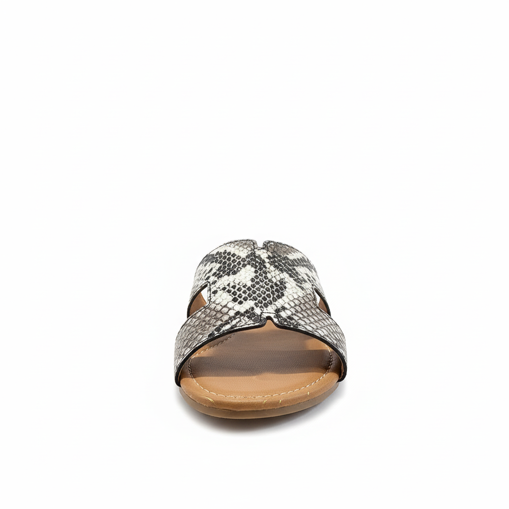 Black and white snake print slide sandals with cutout strap design - front view