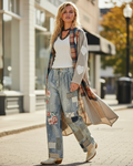 POL Clothing women's natural plaid patchwork longline coat with heart appliqués, walking city sidewalk brunch outfit