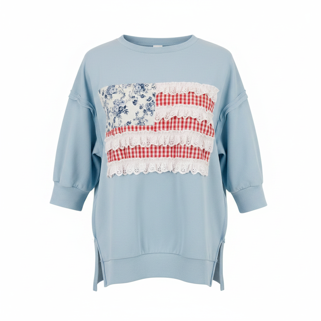 Women's light blue Americana patchwork pullover top front view, flag graphic, drop shoulder, French terry fabric