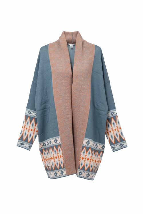 Color-block Aztec print cardigan in dusty blue and peachy-coral - front view showing oversized fit and geometric trim