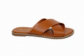 Tan slide sandals with crisscross straps - side profile
