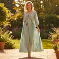 POL women's seafoam green floral embroidered maxi dress, batwing sleeves, walking movement, outdoor setting