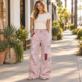 POL Clothing Cloud Pink wide-leg carpenter pants on a sunny boutique sidewalk - BellanBlue