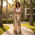 Women's natural cream floral patchwork wide leg cotton gauze pants styled with white crop top boho vacation outfit - BellanBlue