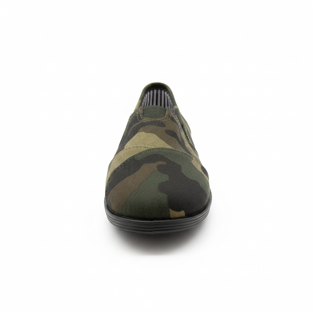 Women's camouflage canvas slip-on flat shoe, front toe view, white background