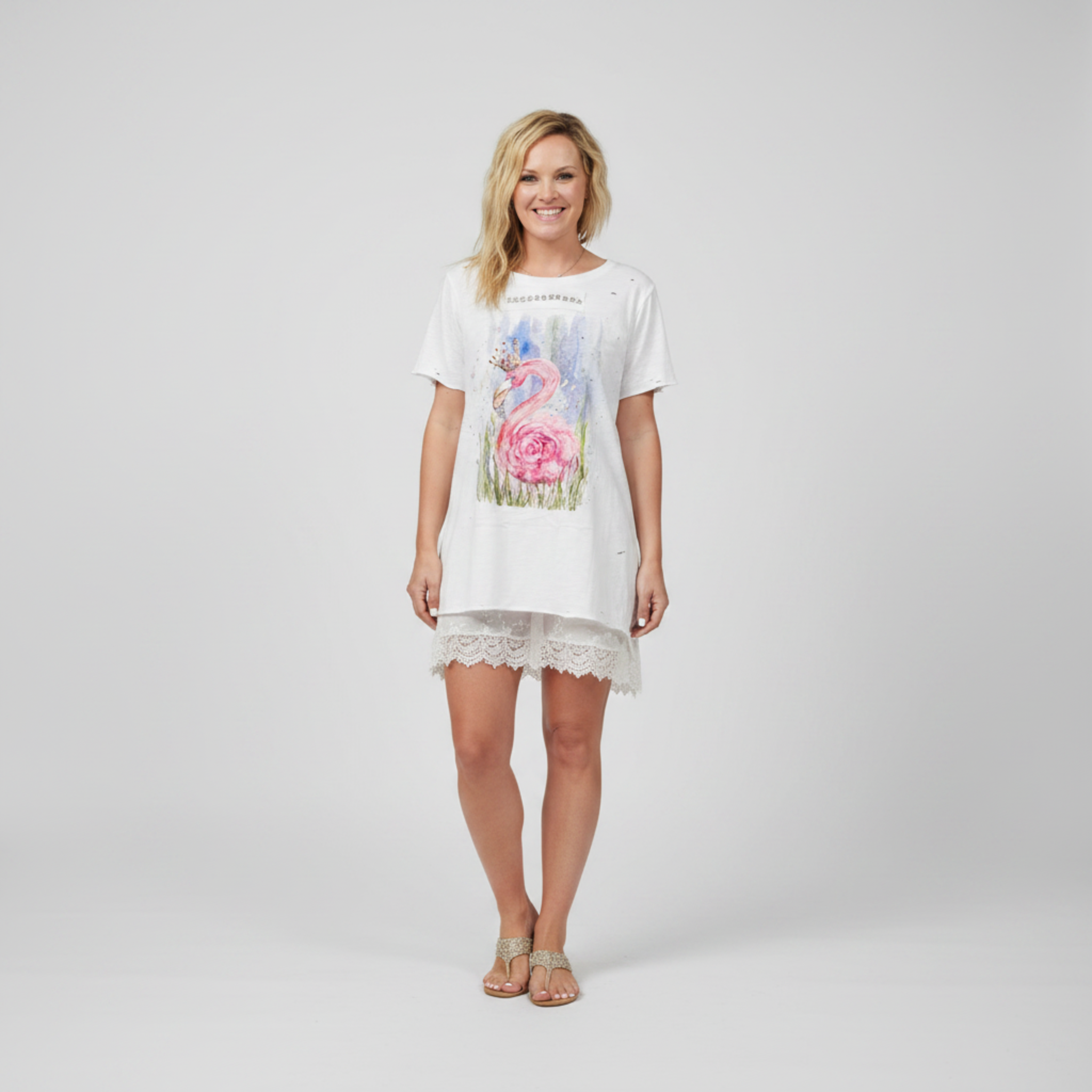 Women's white cotton tee with hand-painted flamingo crown graphic and rhinestone trim, oversized fit, front view