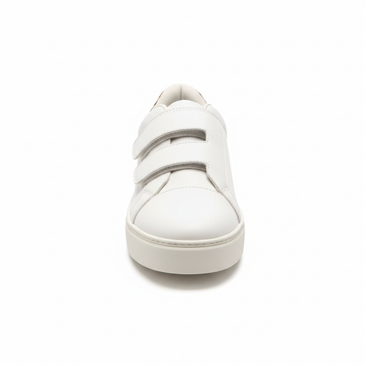 White platform sneaker with leopard print heel detail - front view showing velcro strap closure