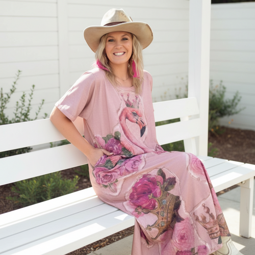 Women's blush pink graphic print maxi dress, crowned flamingo print, jersey knit, relaxed fit, seated
