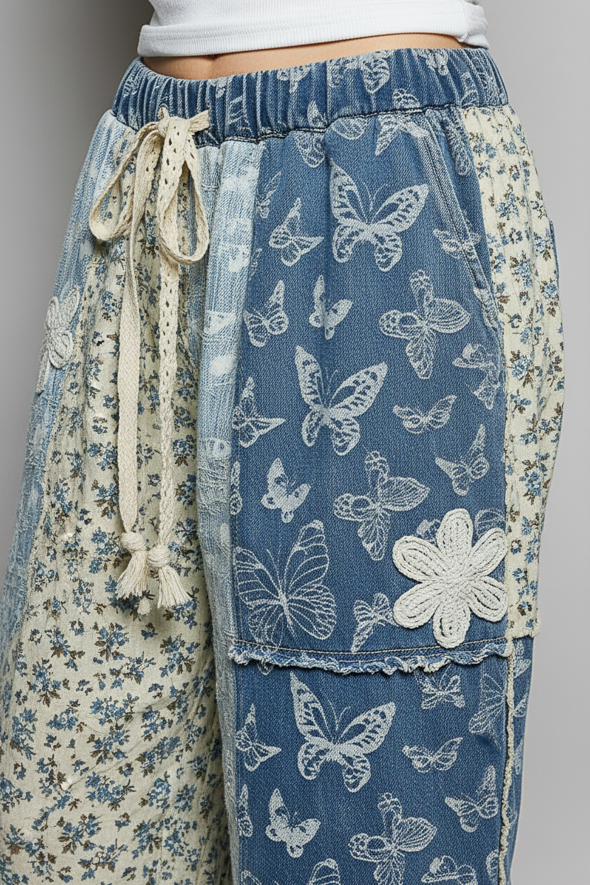 POL Patchwork Butterfly Print Joggers in Blue Butterfly Multi - detail shot of patchwork and fabric