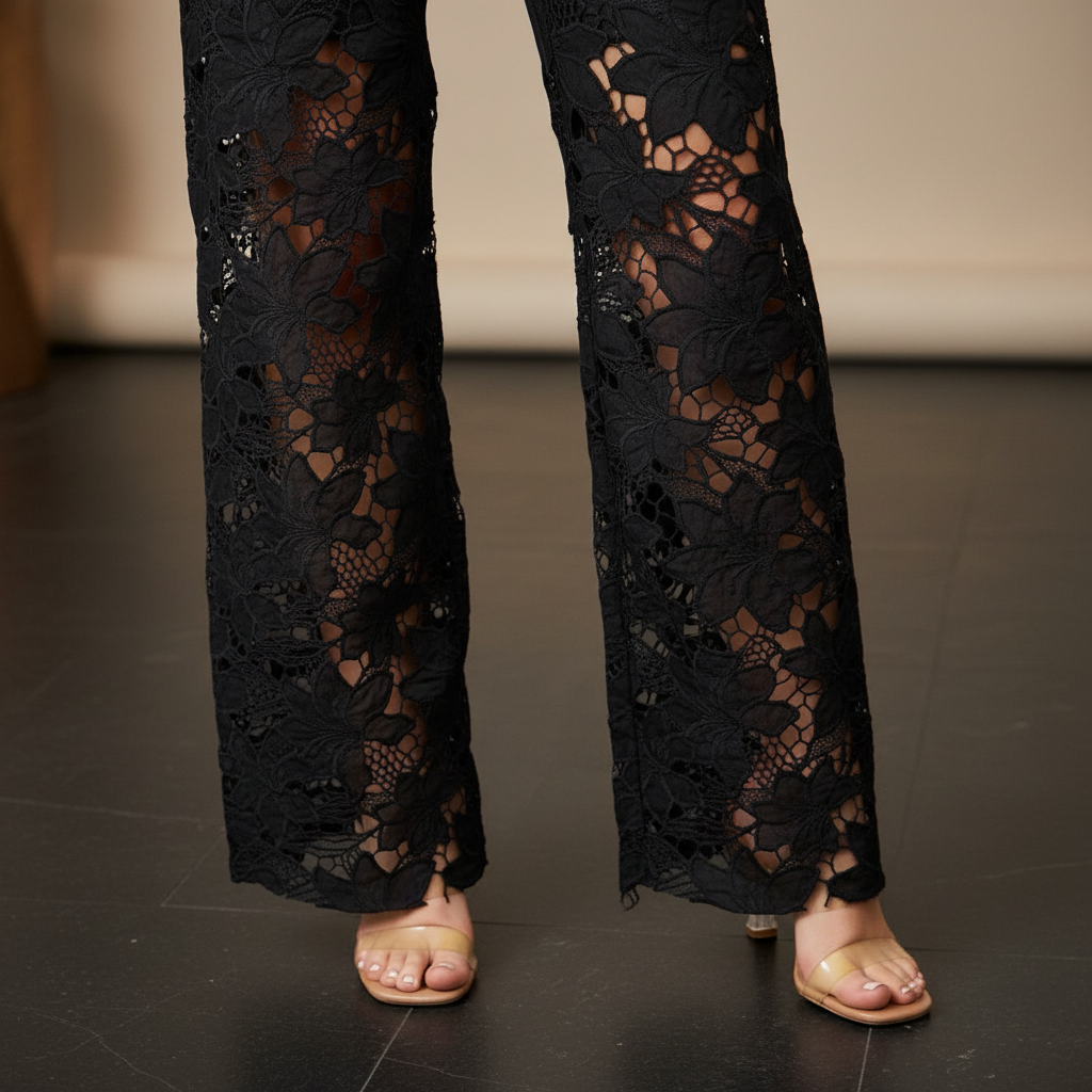 3D black floral crochet lace panel wide-leg jeans close-up knee to hem detail