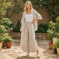 BiBi women's teal floral stripe wide-leg pants styled on model in garden patio setting - BellanBlue