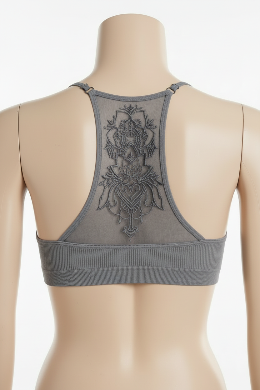 Leto Collection grey racerback bralette back view on mannequin, tattoo mesh mandala panel detail, white background
