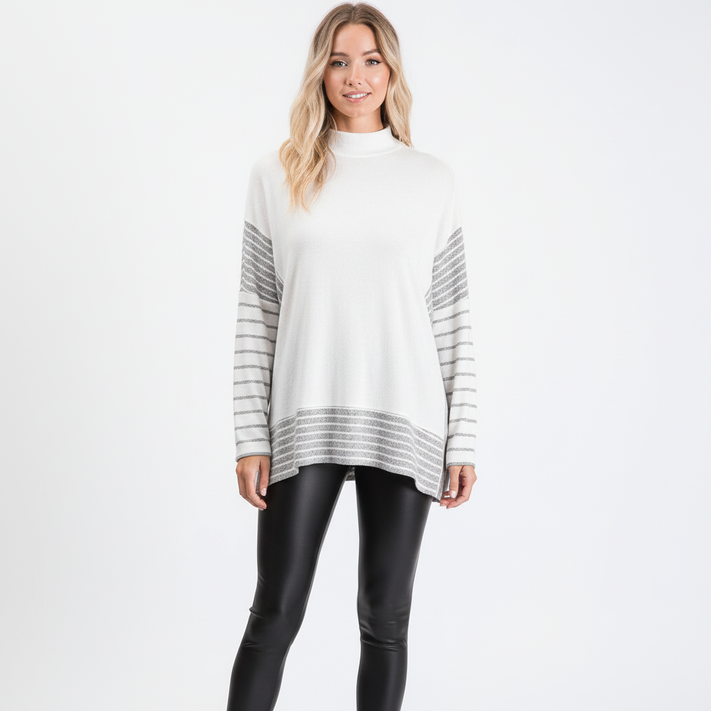 Women's white striped knit pullover sweater front view studio white background black leggings regular fit