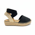 Black canvas espadrille sandal side profile showing platform height and ankle wrap detail