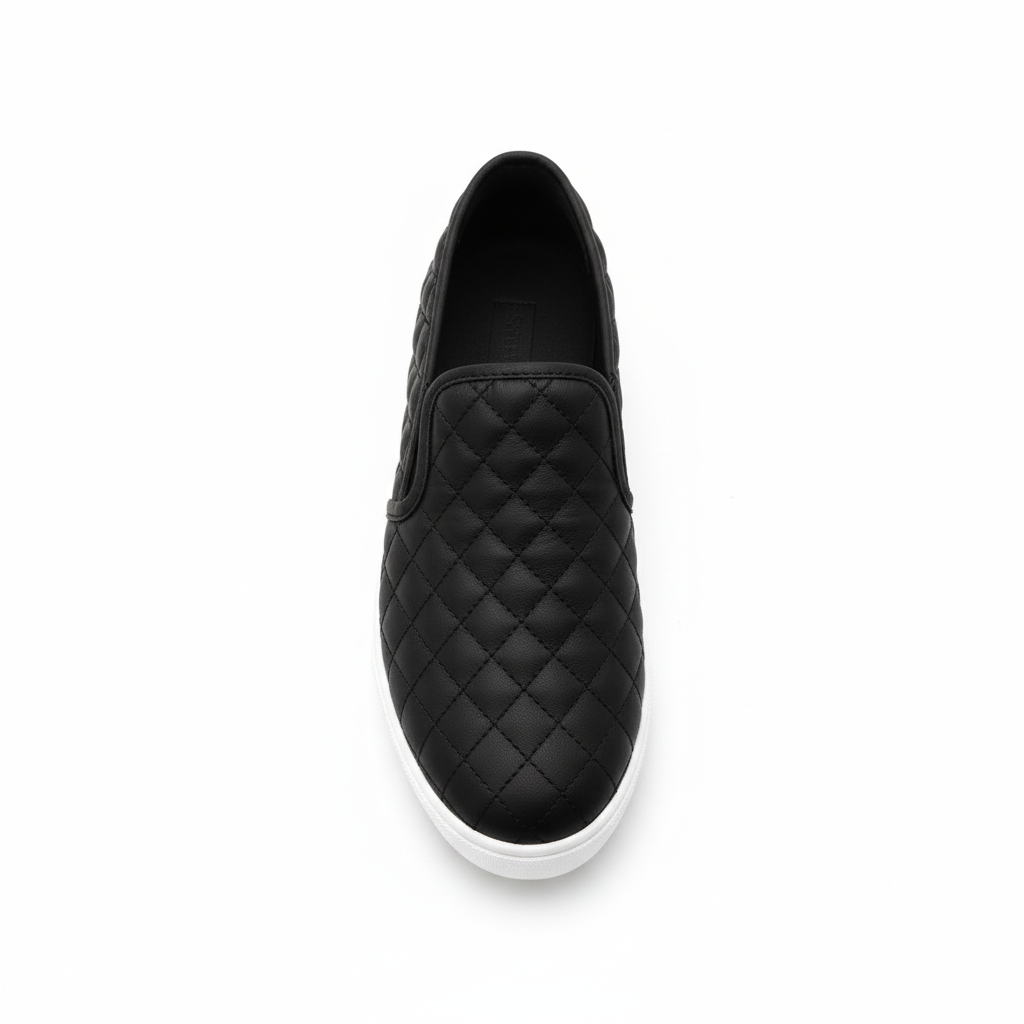 Black quilted slip-on platform sneakers - top view showing quilted pattern