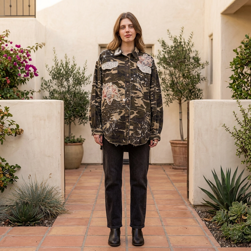 Blue Velvet women's camo floral patchwork jacket, front view in a courtyard - BellanBlue