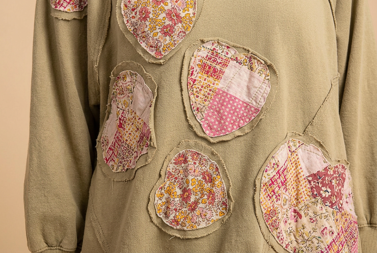Blue Velvet sage heart patchwork sweatshirt fabric texture and applique stitching close-up